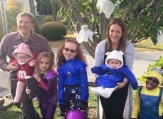Stuart with his wife and children